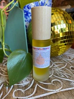 BEAUTY + WELLNESS EVERYBODY LOVES THE SUNSHINE TANNING OIL- LIVING LIBATIONS